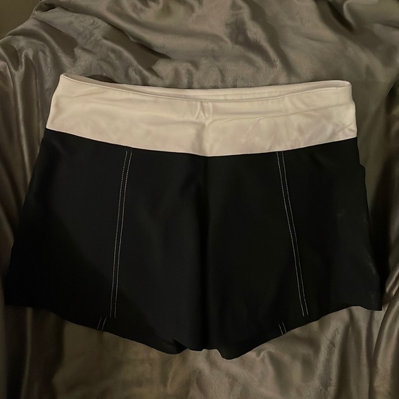 Lululemon size 4 Black shorts white band. - Picture 1 of 3